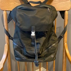 Lululemon olive green gym backpack with separate  shoe compartment.